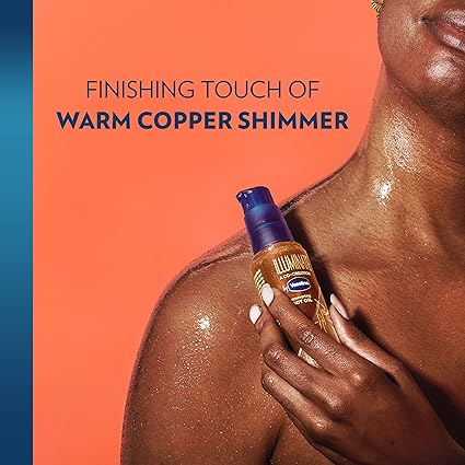 Vaseline Illuminate Me Shimmering Body Oil glow beautifully with a shimmer designed for melanin-rich skin.